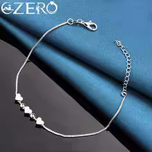 Pulsera oro y plata de corazones