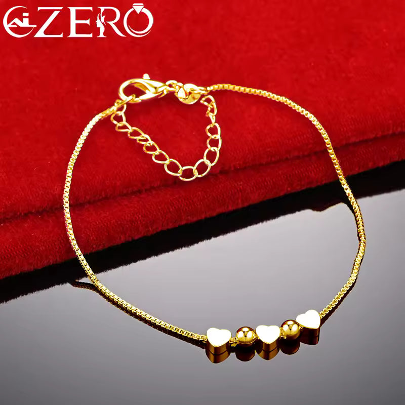 Pulsera oro y plata de corazones